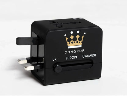 Travel adapter with exposed UK plug and multiple port options - Chargimundo